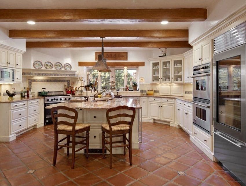 Country Style Kitchen With White Cabinets Spanish Tile Floors 