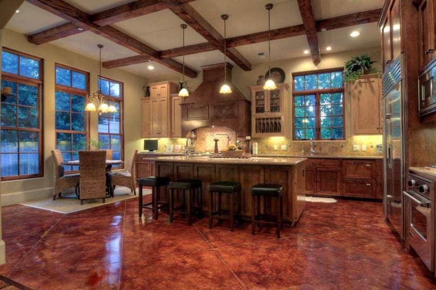 Craftsman kitchen with concrete floors and pendant lights