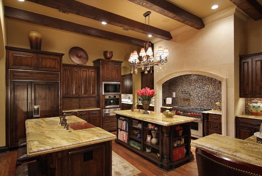 Craftsman kitchen with exposed beam ceiling and mosaic tile backsplash