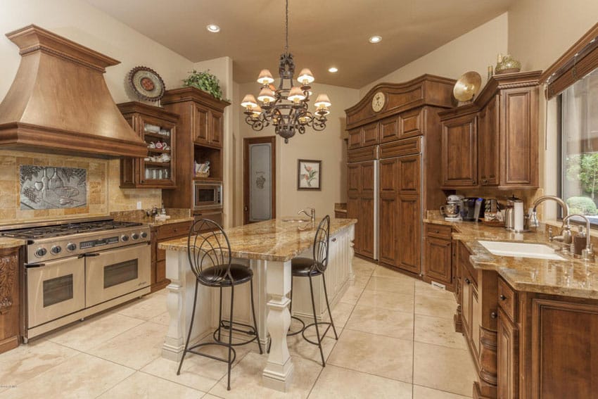 Craftsman kitchen with travertine floors and light granite counter