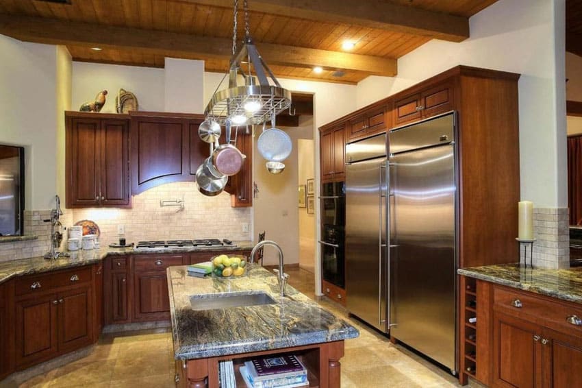 Craftsman style kitchen with hanging pots and pans