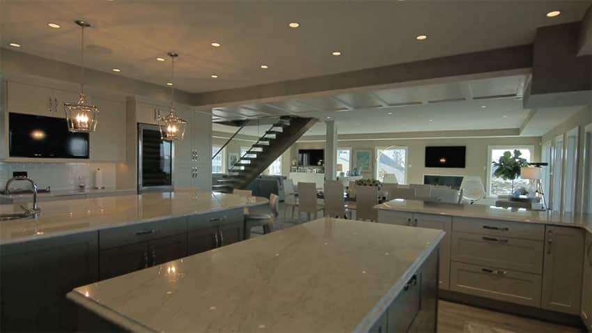 Custom gourmet kitchen with white cabinets