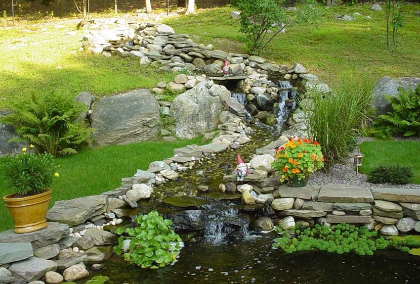 Garden with stone stream and small waterfalls