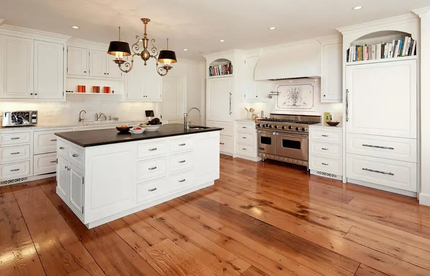 L-shape kitchen with maple plank flooring