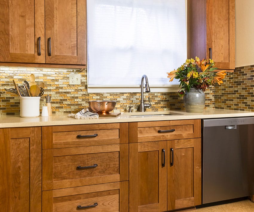 Kitchen with mosaic glass backsplash brown style