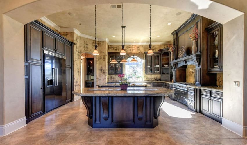 Mediterranean kitchen with arched entry rustic dark cabinetry
