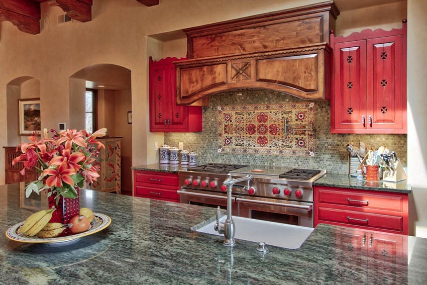 Mediterranean kitchen with coastal gray quartz countertop and red cabinets