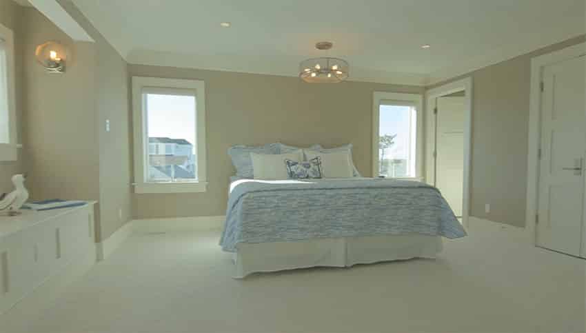Neutral tone bedroom with window seat