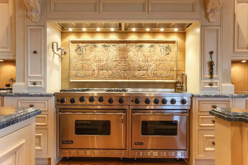 Traditional kitchen with a custom tile mural backsplash