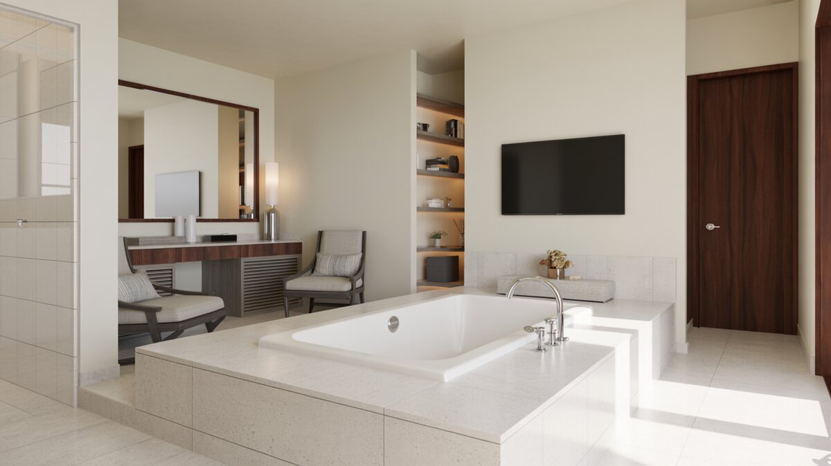 Drop-in tub on a soapstone platform near a lounge chair and television
