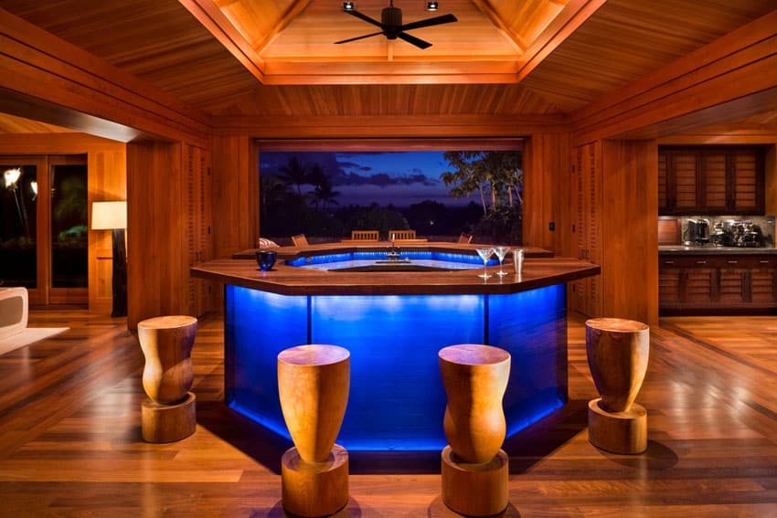 Amazing custom wood home bar with picture window views and under counter lighting