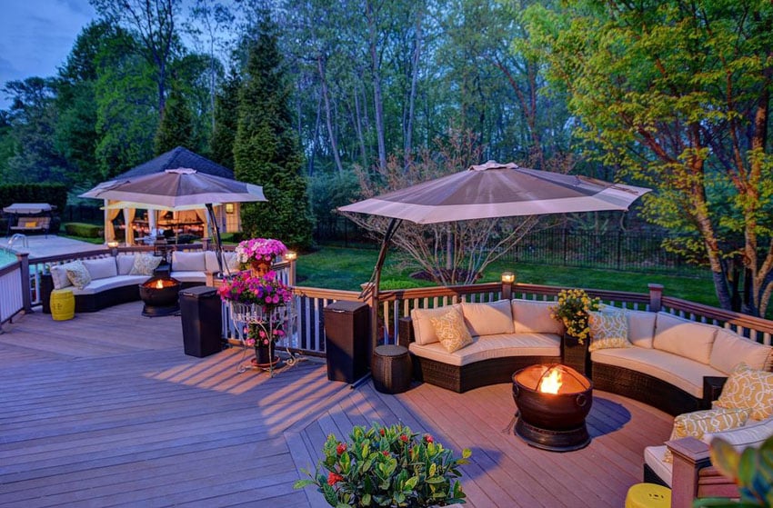 Beautifully decorated composite deck and garden area with canopy