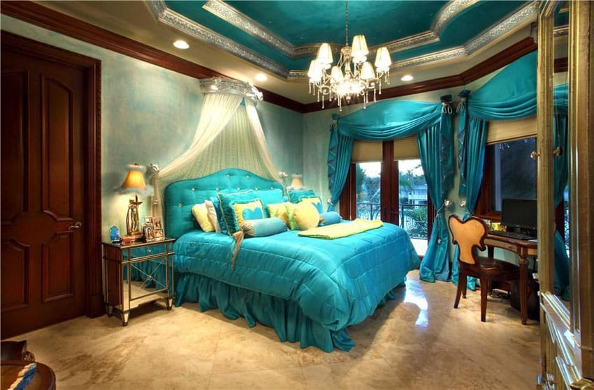 Beautiful blue bedroom with glam decor and furnishings