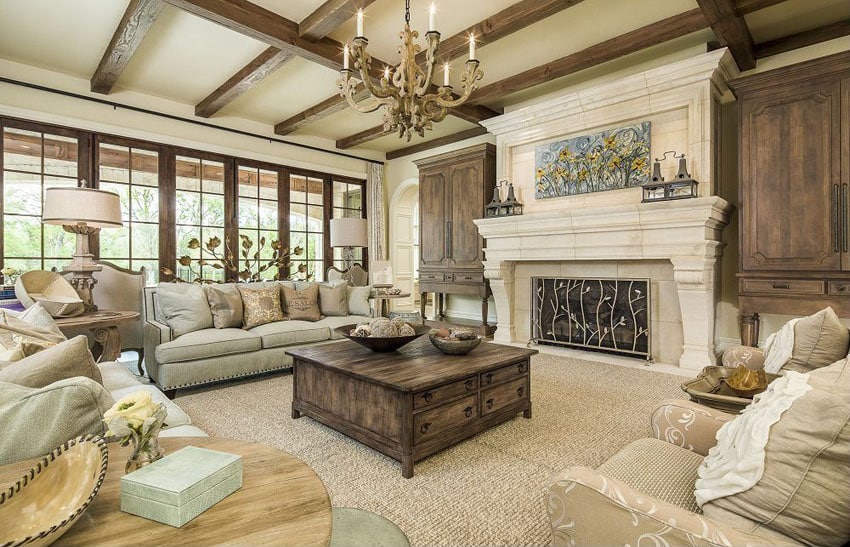 Beautiful craftsman living room with exposed beams and light color stone fireplace