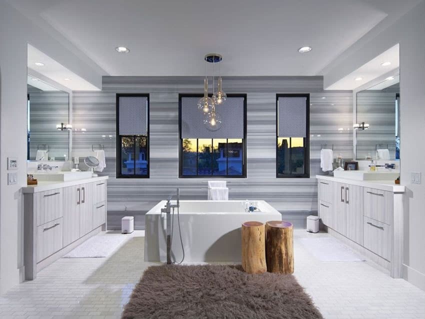 Contemporary bathroom tub with hanging globe lights
