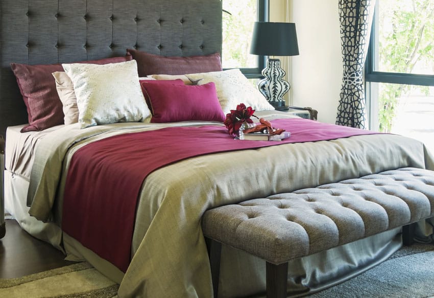 Contemporary bedroom design with gray bed and headboard