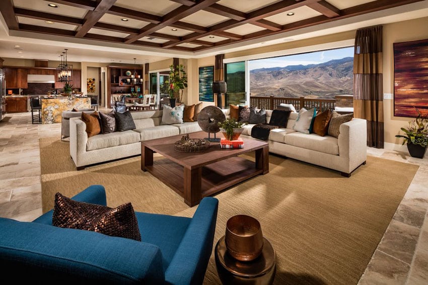 Contemporary living area with coffered ceiling and open view of mountains
