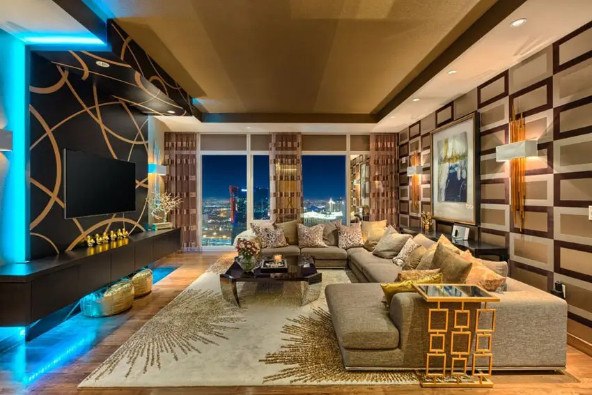 Room with geometric pattern accents, and blue neon liighting