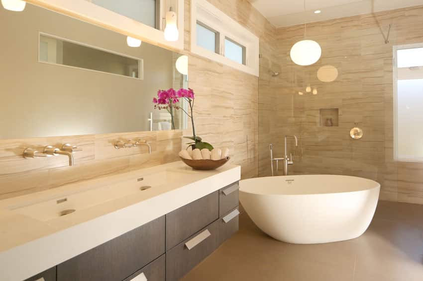 Contemporary master bath with brown themes and soaking tub