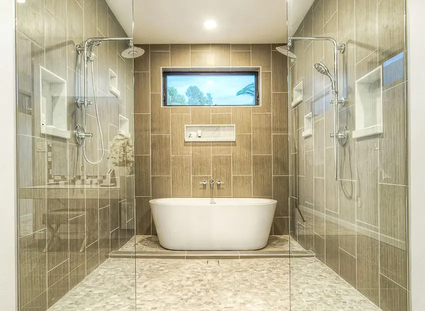 Bathroom with 2 shower areas, vertical ceramic tiles for the walls and granite floor tiles