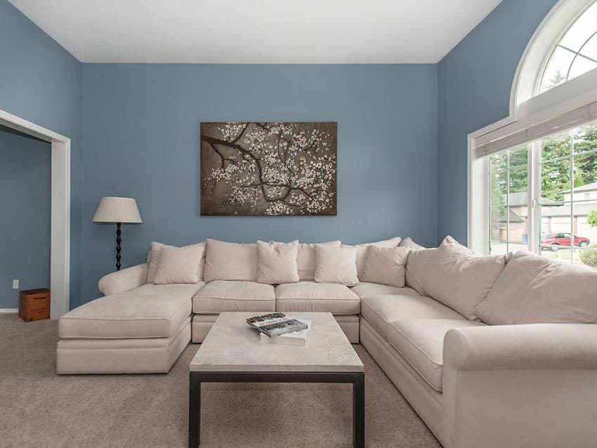 White Living Room Walls And Grey Blue Couch