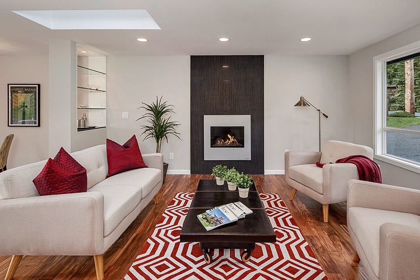 Cozy contemporary living room with gas fireplace and wood floors
