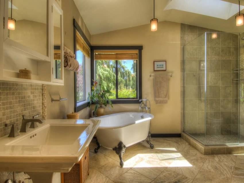 Craftsman bathroom with natural porcelain tiles for walls and floors and pedestal sink