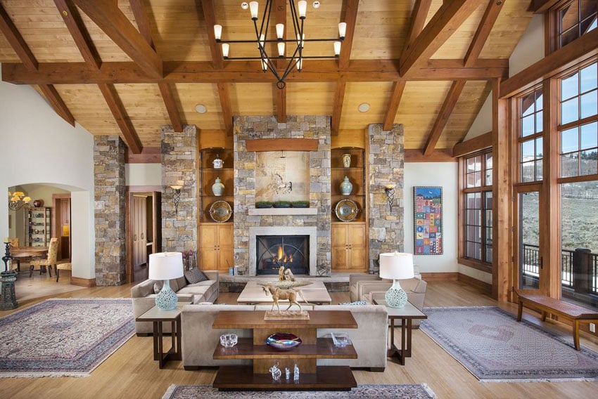 Craftsman living room with large window view and vaulted ceiling