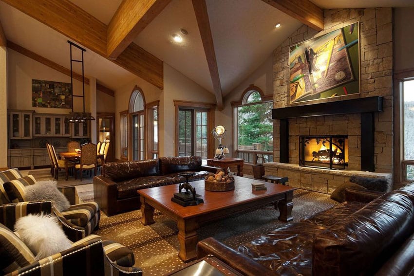 Craftsman living room with leather furniture and cathedral ceiling