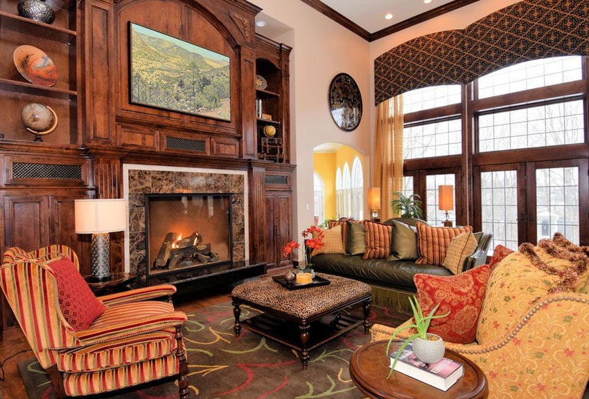 Craftsman room with detailed woodwork molding and fireplace