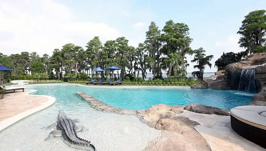 Custom swimming pool with alligator statue