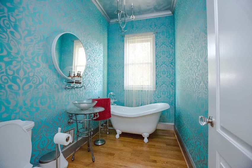 Eclectic bathroom with acrylic clawfoot tub with imperial feet