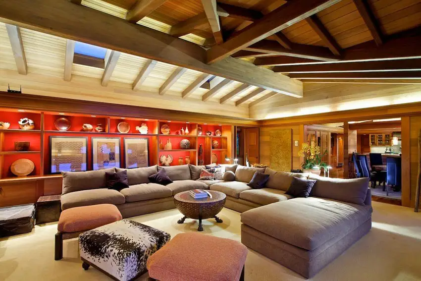 Eclectic living room design with bright red accent wall