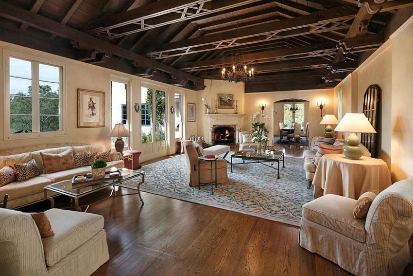 Large craftsman living room with hardwood flooring and dark wood ceiling
