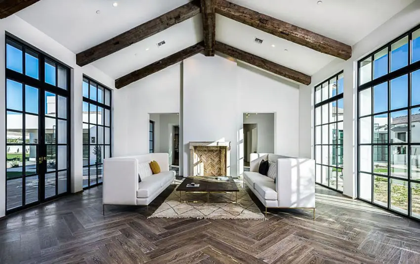 Sunroom style windows and floors with herringbone pattern 