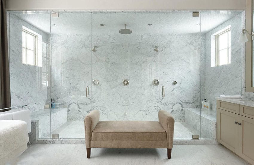 Large luxury shower with bianco gioia marble