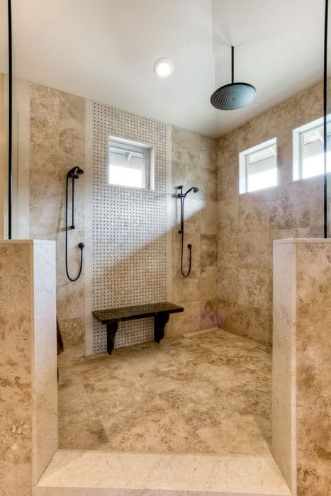 Large luxury shower with rainfall showerhead glazed porcelain tile and mosaic tile accent wall
