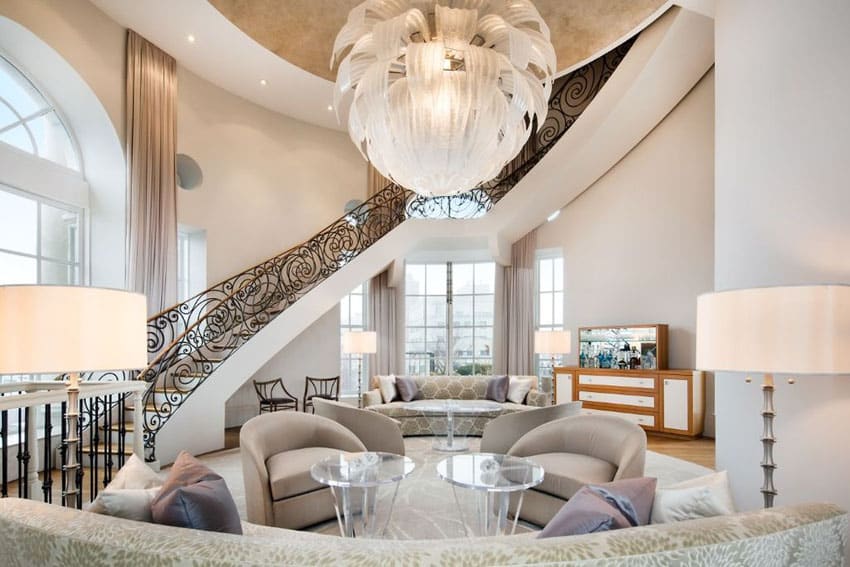 Flower style chandelier, a winding staircase and arching clerestory windows