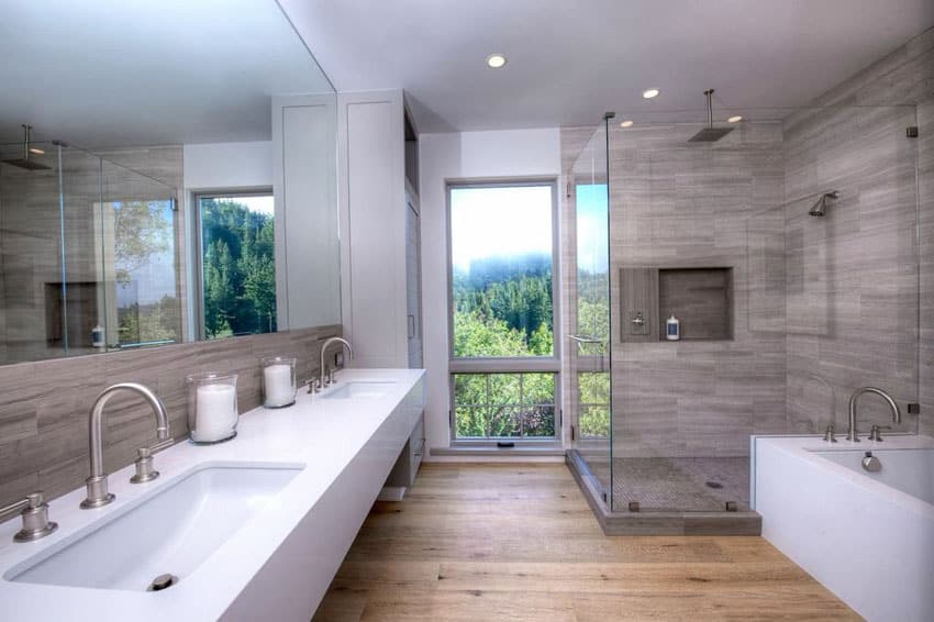 Luxury bathroom with shower with window views and porcelain tile