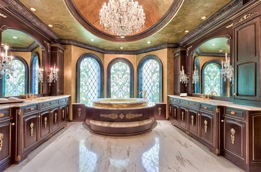 Luxury bathroom with whirlpool tub and chandelier