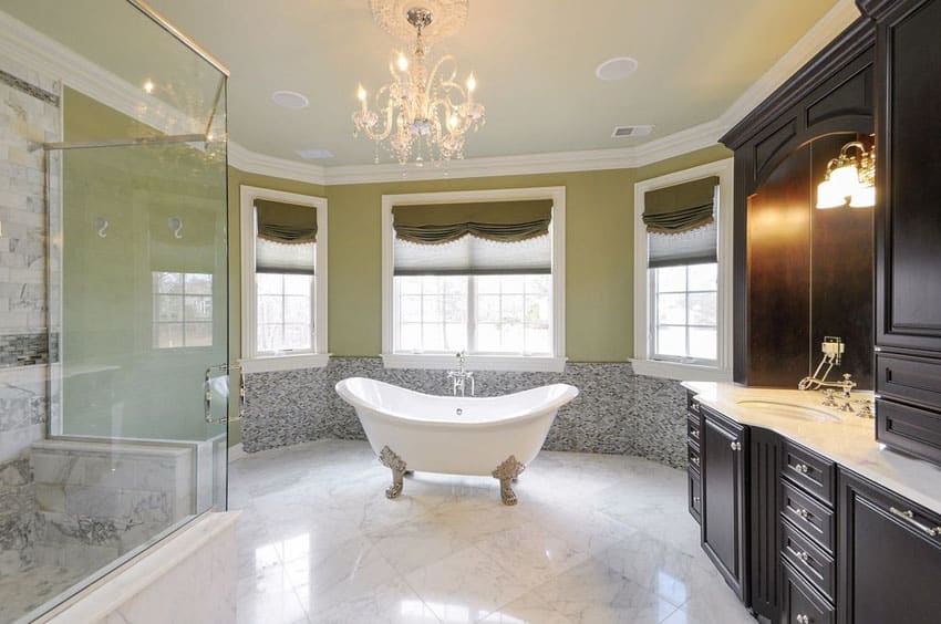 Bathroom with sage green wall, white marble floors and bay window