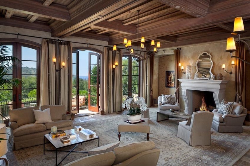 Luxury craftsman living room with custom fireplace and french doors