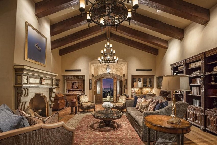 Luxury craftsman living room with elegant furniture and large vaulted beams
