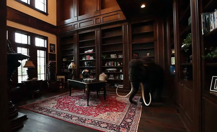 Luxury custom wood home office with built in bookshelves