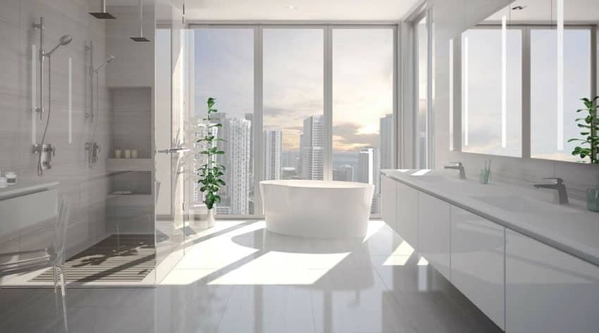 Bathroom with glossy white cabinets, laminated vanity and frameless wall mirror