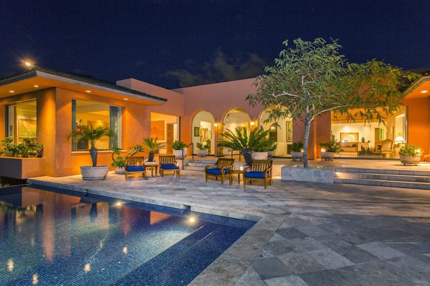 Luxury patio with swimming pool and tropical plants