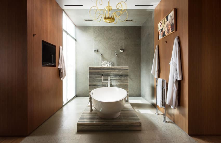 Master bathroom with pedestal bathtub and contemporary design style
