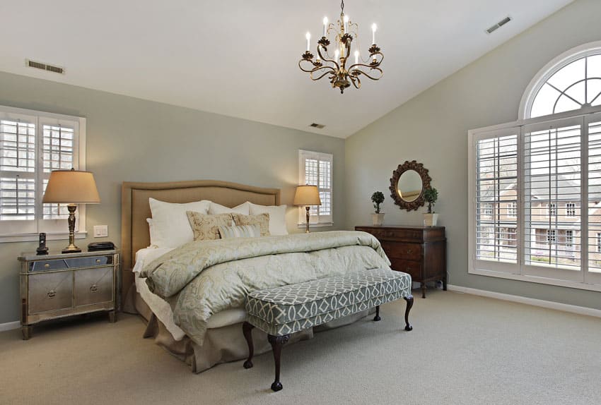 Master bedroom in luxury home with circular window