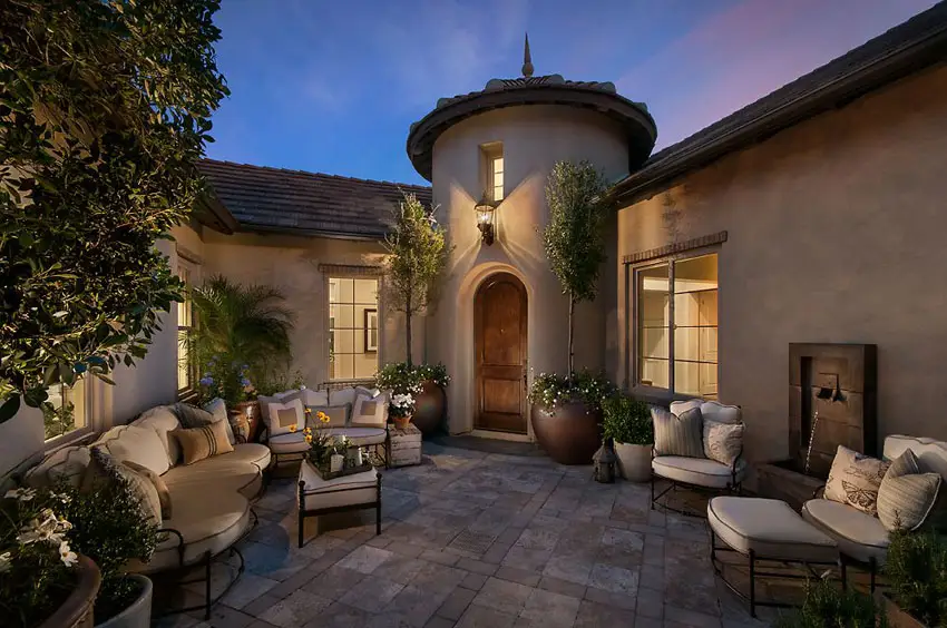 Patio with comfortable outdoor seating and fountain