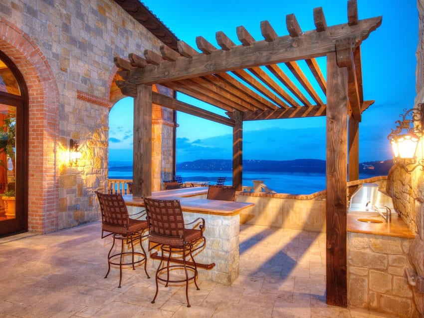 Mediterranean style patio with pergola and ocean views